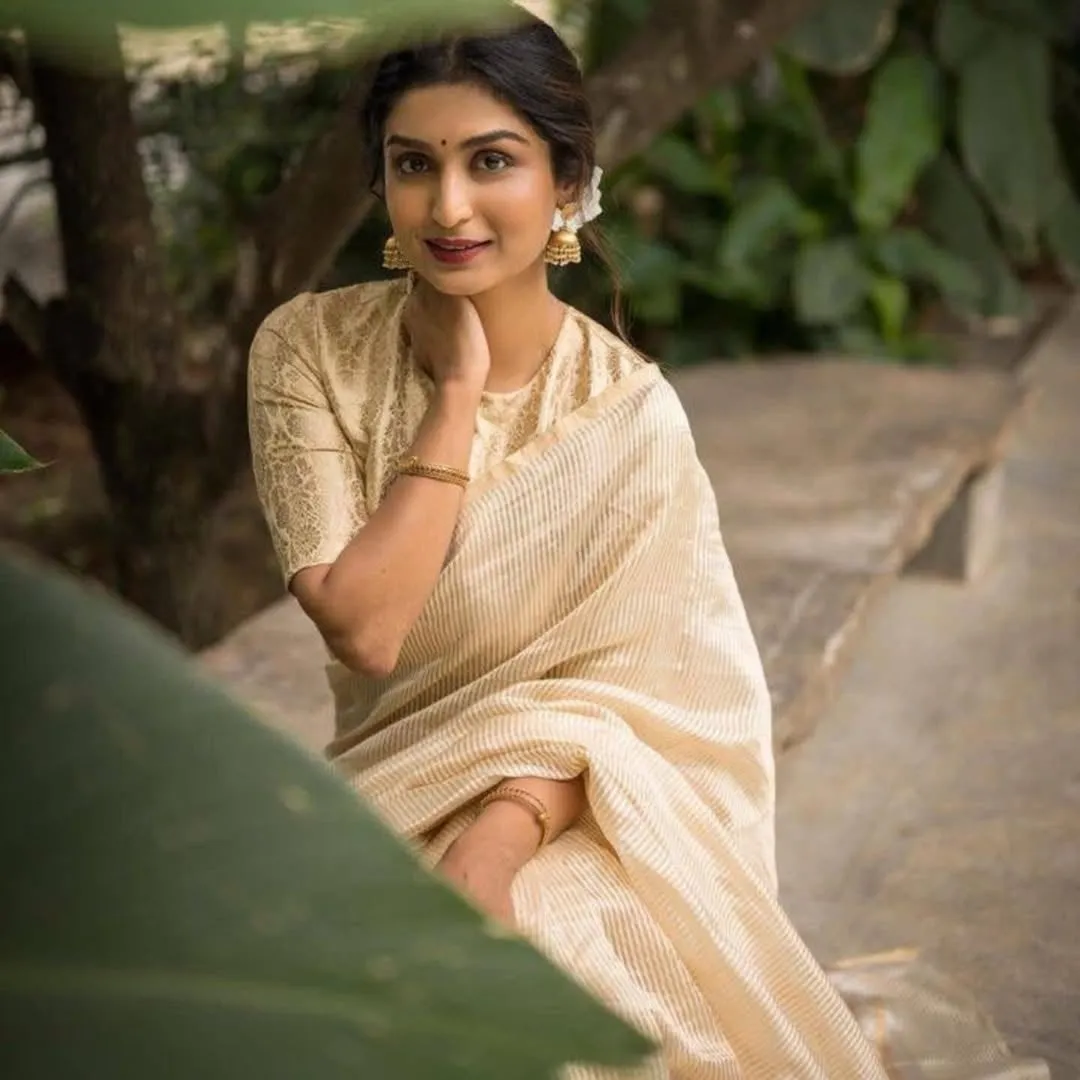 Symmetrical Beige Soft Silk Saree With Prodigal Blouse Piece