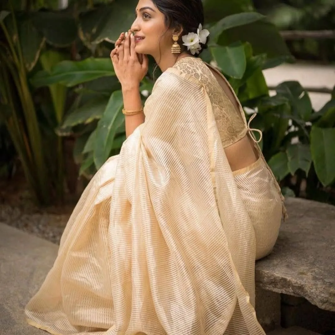 Symmetrical Beige Soft Silk Saree With Prodigal Blouse Piece